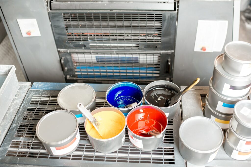 Buckets with CMYK paints