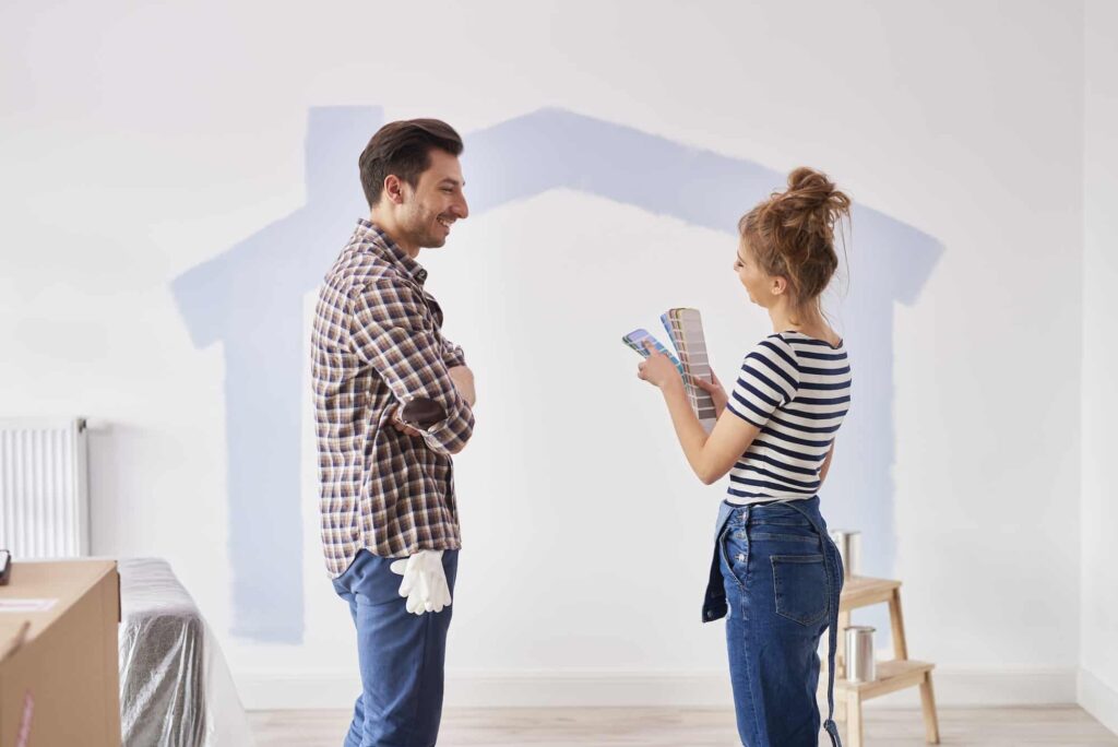 couple-painting-the-interior-wall-in-their-new-apartment.jpg